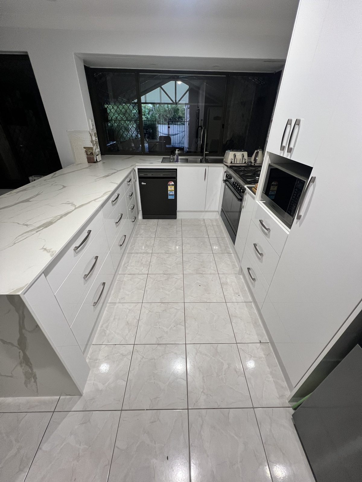 Kitchen after facelift by Bhadu Cabinets